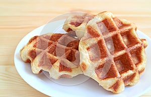 Delectable Belgian Liege Waffles on a White Plate