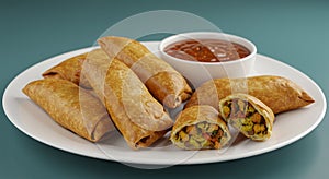 Crispy Golden Spring Rolls with Savory Filling and Dipping Sauce