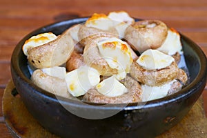 Delectable Soko Ketze, a Georgian Stuffed Mushrooms with Sulguni Cheese Baked in a Clay Bowl