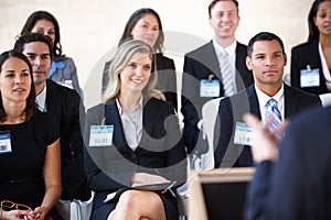 Delegates Listening To Speaker At Conference