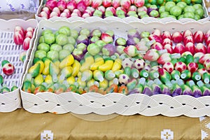 Deletable imitation fruits (kanom look choup) on sale