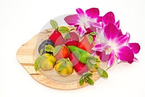 Deletable imitation fruits Thai Dessert with orchid