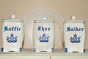 Delft Blue Coffee, Tea, and Sugar Koffie, Thee, Suiker containers. Famous porcelain souvenirs from Holland/Netherlands. Isolated