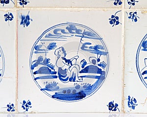 Delft tile with painting of shepherd