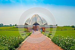 Delhi, India - September 27, 2017: Unidentified people walking and enjoying the beautiful Lotus Temple, located in New