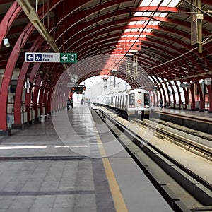 Delhi Metro train arriving at Jhandewalan metro station in New Delhi, India, Asia, Public Metro departing from Jhandewalan station