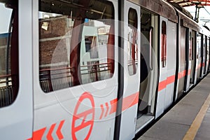 Delhi Metro train arriving at Jhandewalan metro station in New Delhi, India, Asia, Public Metro departing from Jhandewalan station