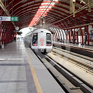 Delhi Metro train arriving at Jhandewalan metro station in New Delhi, India, Asia, Public Metro departing from Jhandewalan station