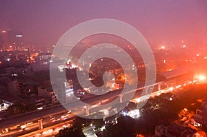 Delhi Noida Gurgaon with heavy pollution smog at dusk