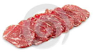 Deli sliced capicola on a white background, fresh and appetizing.