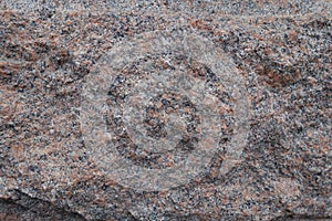 Deliberately rough surface of granite stone