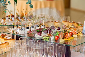 Delicacies and snacks at the Banquet. The buffet celebration. Restaurant catering. Table setting at the reception