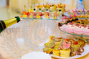 Delicacies and snacks in the buffet. Champagne. Seafood. A gala reception. Banquet