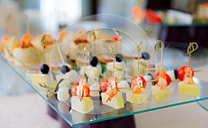 Delicacies and snacks in the buffet. Champagne. Seafood. A gala reception. Banquet.