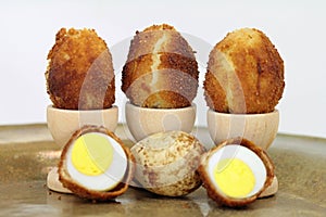 Delicacy quail eggs, breaded and crispy fried