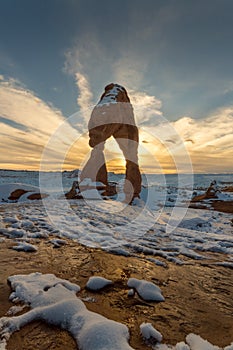 Delicate Arch with Snow during Sunset