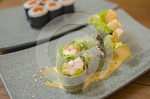 Delicate assorted Japanese sushi rolls on beautiful set up on table in traditional healthy Asian food and creative oriental dining