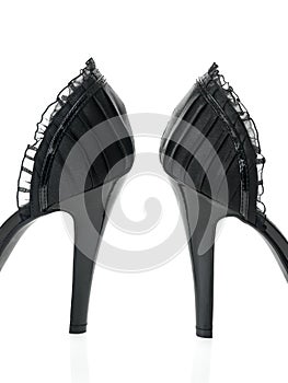Delicate black laces high heels detailed view