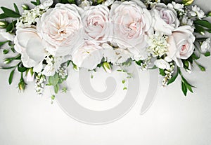 Delicate blooming festive roses and light pink flowers background, blossoming rose flower soft pastel frame