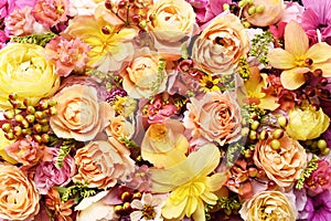Delicate blooming festive roses and yellow summer flowers, blossoming rose flower soft pastel background