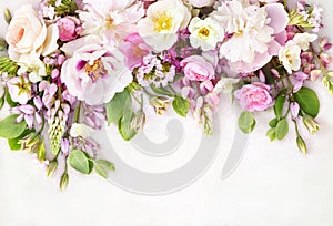 Delicate blossoming roses and blooming flowers festive background, pastel and soft bouquet floral card