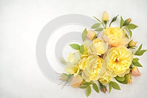 Delicate blossoming yellow rose flowers, blooming festive fall frame background, autumn bouquet floral card