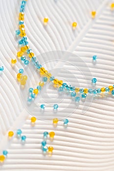 Delicate blue and yellow beaded necklace