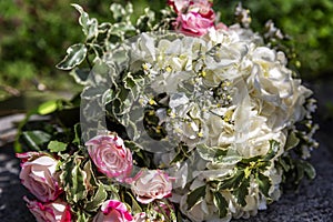 Delicate bouquet of the bride in nature. Holidays and events. Close-up