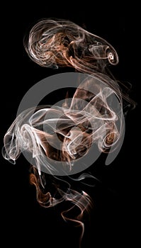 Delicate and bright smoke waves on dark background