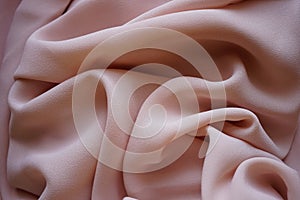 Delicate cream thin chiffon, beige fabic waves background