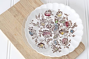 Delicate Floral Plate with Wooden Board