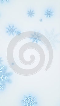 Delicate glowing blue snowflakes forming an abstract winter background with soft icy light