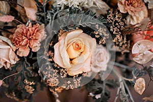 Delicate light coral flowers bouquet detail