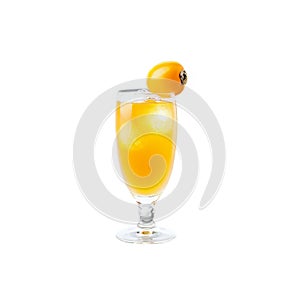 Delicate loquat soda in a Collins glass loquats with their apricot like appearance Summer freshness