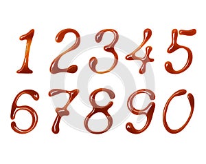 Delicate numbers made of caramel on white background