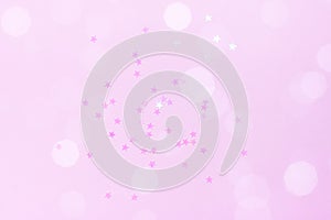 Delicate pink background with stars.