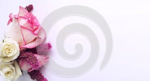 Delicate pink roses on a white background. Festive flower arrangement.