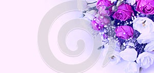Delicate pink roses on a white background. Festive flower arrangement.