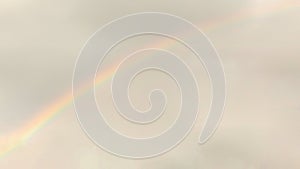 Faint Rainbow in a Cloudy Sky