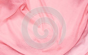 Delicate soft and wrinkled fabric pink color background texture