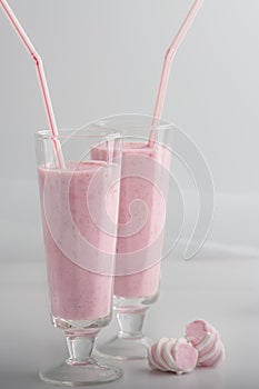 Delicate strawberry drink in glass