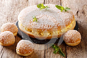 Delicate tropezienne tarte - brioche sandwich cake with cream cl