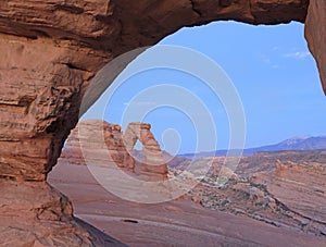 Delicate viewed through a natural window in Arch in Arches National Park, Utah