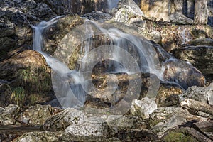 delicate waterfall in the mountains