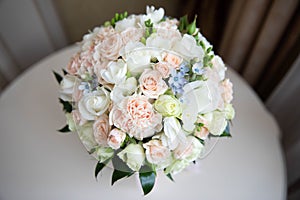 Delicate wedding bouquet of white and pink roses.Delicate wedding bouquet of white and pink roses