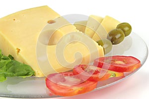 Delicatessen cheese served on dish