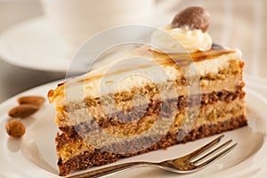 Deliceous slice og Caramel Mousse cake on a plate for breakfast