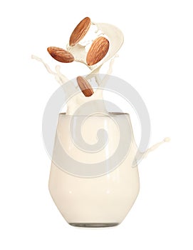 Delicious almond milk and nuts on white background