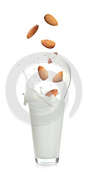 Delicious almond milk and nuts on white background