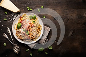 Delicious appetizing classic spaghetti pasta with tomato sauce, parmesan